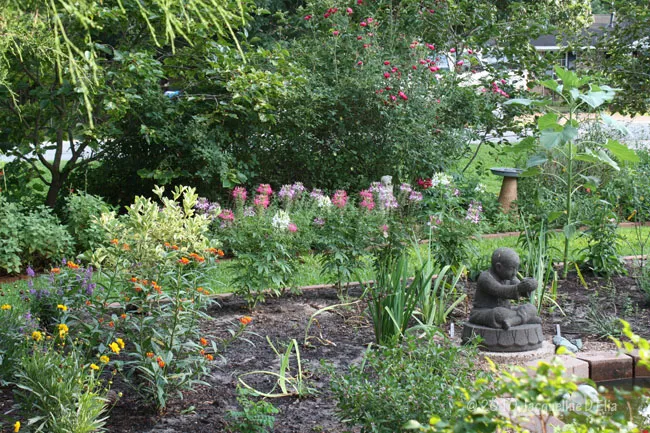 A statue in a garden.