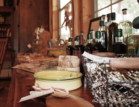 A wooden table with a lot of items on it.
