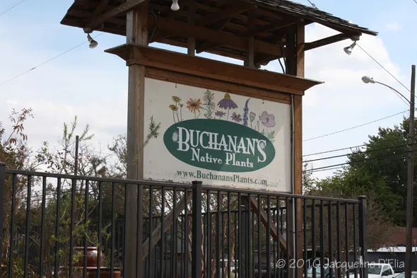 A sign for ruthman's garden farm.