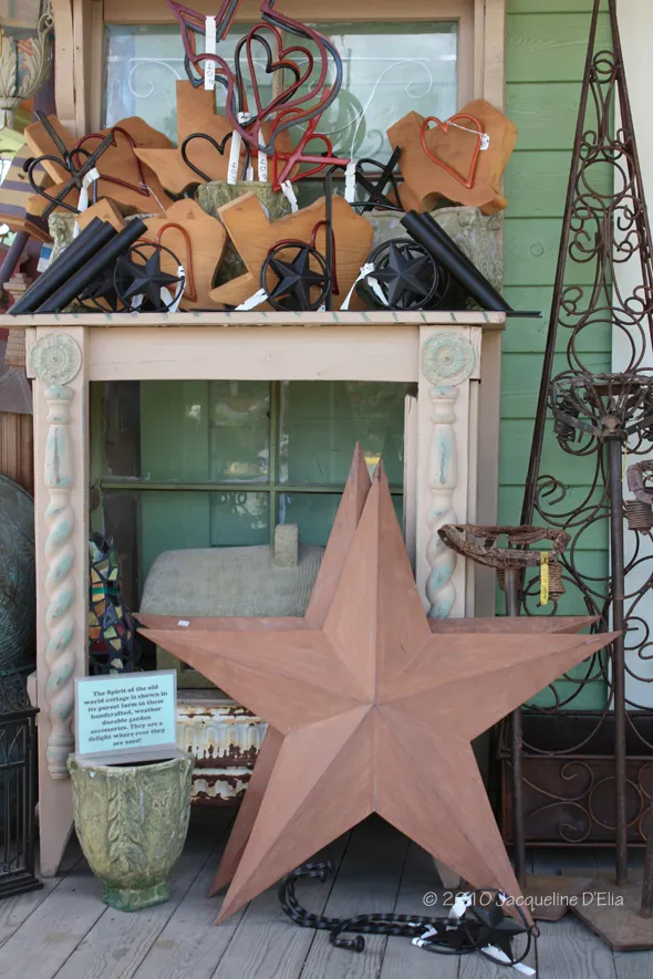 A large wooden star on a mantle.
