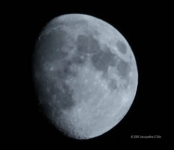 A close up of the moon in the dark sky.