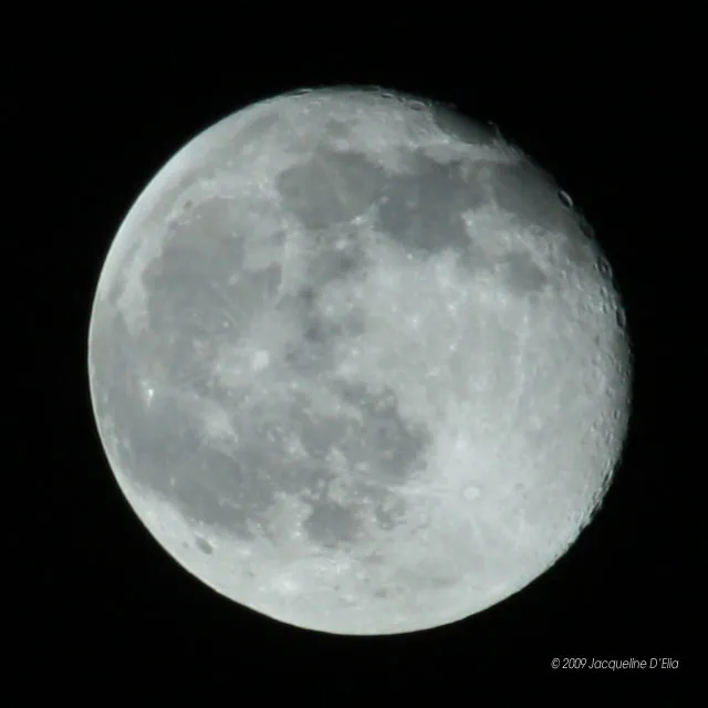 A close up of the moon in the night sky.