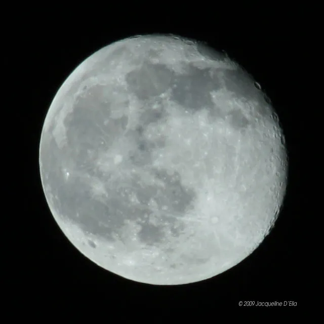 A close up of the moon in the night sky.