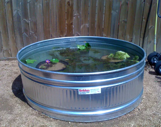 A metal tub filled with water.